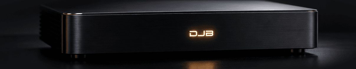 Concept visualisation of Reference One, a compact low-profile black aluminium media player with a discreet amber DJB mark.
